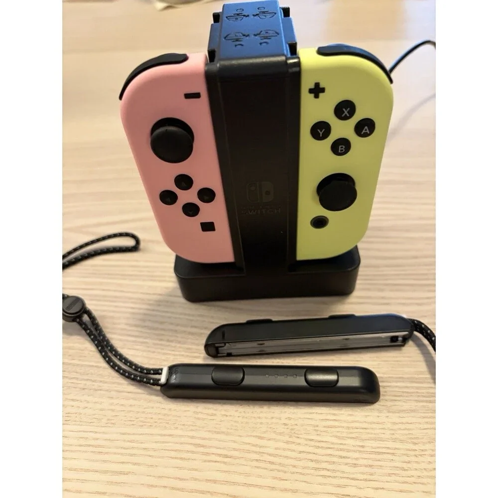 Nintendo Switch Joy-Con Controllers Neon Pink Yellow Charging Dock Wrist Straps